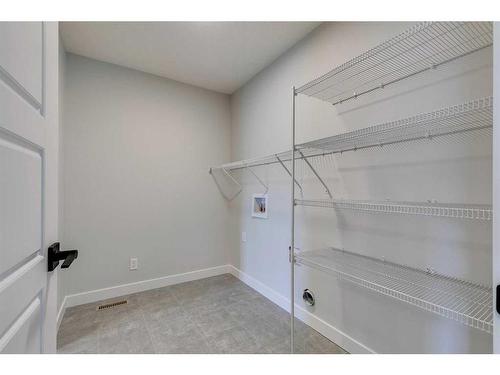 23 Wolf Hollow Road Se, Calgary, AB - Indoor With Storage