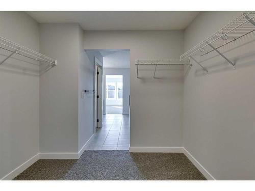 23 Wolf Hollow Road Se, Calgary, AB - Indoor With Storage