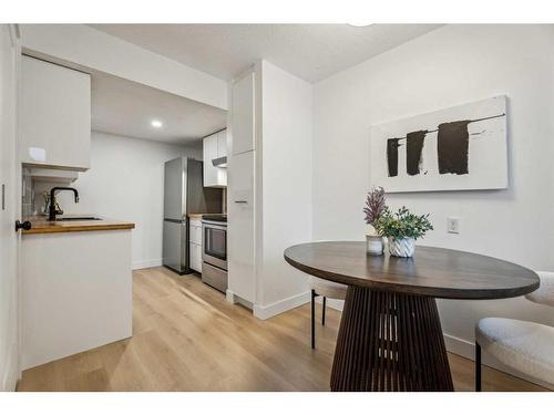 111-1055 72 Avenue Nw, Calgary, AB - Indoor Photo Showing Dining Room