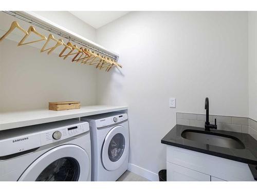 24 Royal Elm Green Nw, Calgary, AB - Indoor Photo Showing Laundry Room