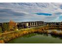 24 Royal Elm Green Nw, Calgary, AB  - Outdoor With Body Of Water With View 