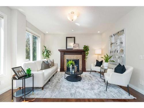 76 Mahogany Manor Se, Calgary, AB - Indoor Photo Showing Living Room With Fireplace