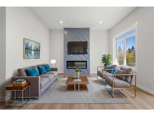 3812 Centre A Street Ne, Calgary, AB - Indoor Photo Showing Living Room With Fireplace