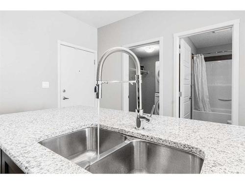 330-20 Seton Park Se, Calgary, AB - Indoor Photo Showing Kitchen With Double Sink