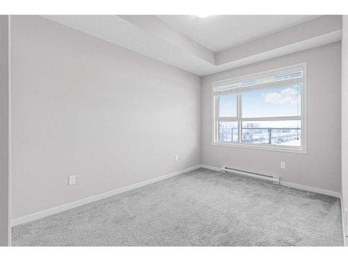 330-20 Seton Park Se, Calgary, AB - Indoor Photo Showing Other Room