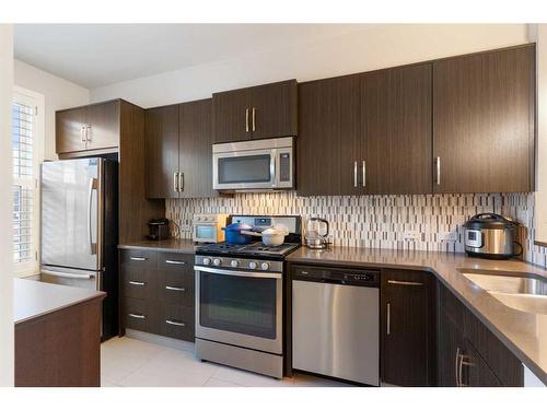 113 Ascot Point Sw, Calgary, AB - Indoor Photo Showing Kitchen With Stainless Steel Kitchen