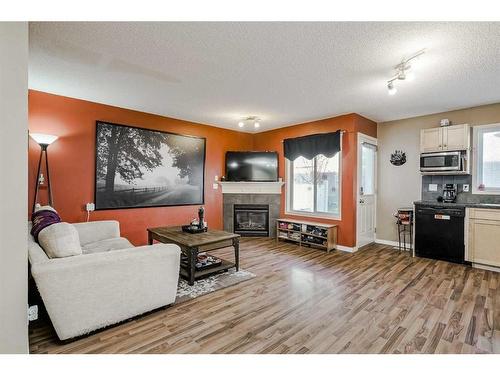 140 Royal Oak Gardens Nw, Calgary, AB - Indoor With Fireplace