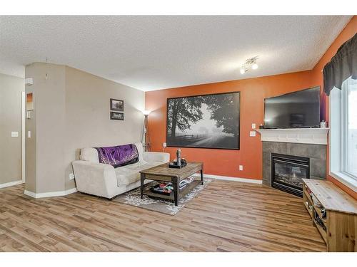 140 Royal Oak Gardens Nw, Calgary, AB - Indoor Photo Showing Living Room With Fireplace