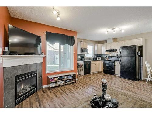 140 Royal Oak Gardens Nw, Calgary, AB - Indoor With Fireplace