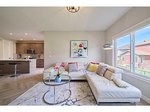 48 Shawnee Green Sw, Calgary, AB - Indoor Photo Showing Living Room