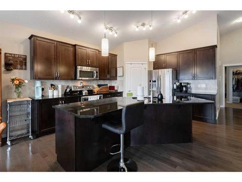 28 Jumping Pound Rise, Cochrane, AB - Indoor Photo Showing Kitchen With Upgraded Kitchen