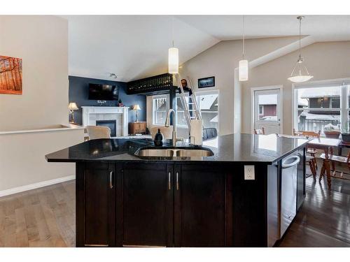 28 Jumping Pound Rise, Cochrane, AB - Indoor Photo Showing Kitchen With Double Sink With Upgraded Kitchen