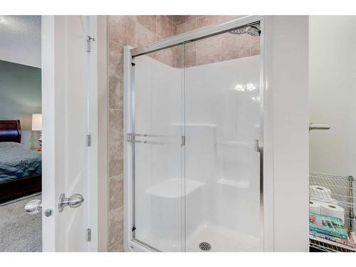 28 Jumping Pound Rise, Cochrane, AB - Indoor Photo Showing Bathroom