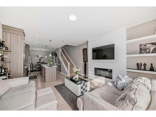 5-129 Skyview Parade Ne, Calgary, AB - Indoor Photo Showing Living Room With Fireplace