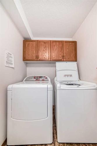 308-7239 Sierra Morena Boulevard Sw, Calgary, AB - Indoor Photo Showing Laundry Room