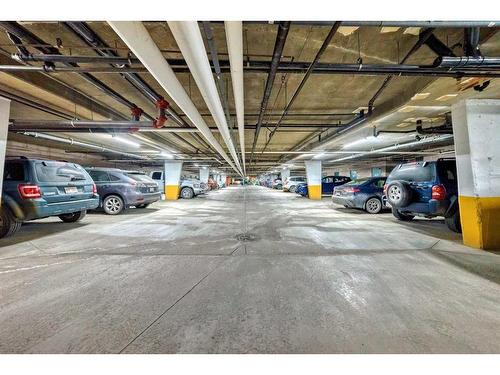 308-7239 Sierra Morena Boulevard Sw, Calgary, AB - Indoor Photo Showing Garage