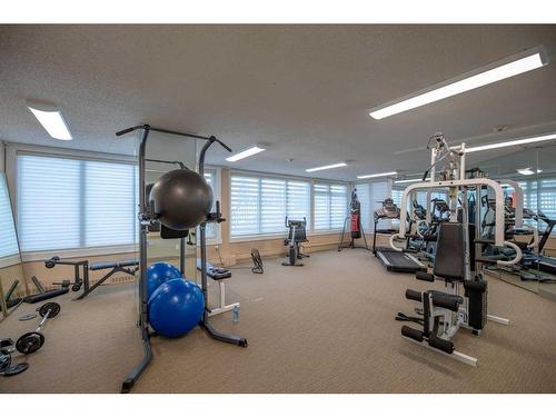 203-511 56 Avenue Sw, Calgary, AB - Indoor Photo Showing Gym Room