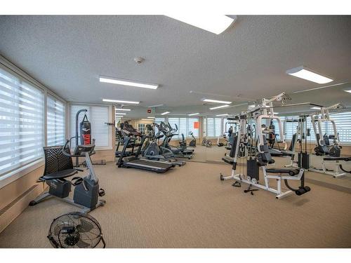 203-511 56 Avenue Sw, Calgary, AB - Indoor Photo Showing Gym Room