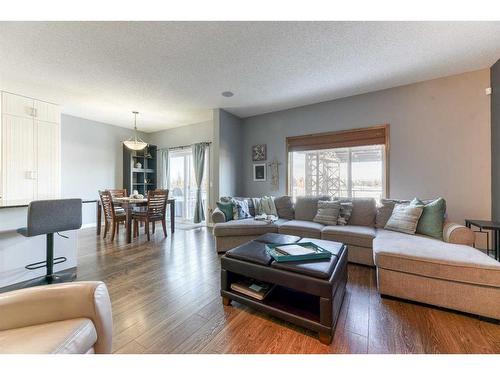 230 Tuscany Vista Road Nw, Calgary, AB - Indoor Photo Showing Living Room