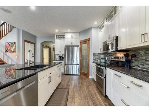 230 Tuscany Vista Road Nw, Calgary, AB - Indoor Photo Showing Kitchen With Double Sink With Upgraded Kitchen