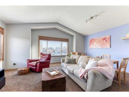 230 Tuscany Vista Road Nw, Calgary, AB - Indoor Photo Showing Living Room