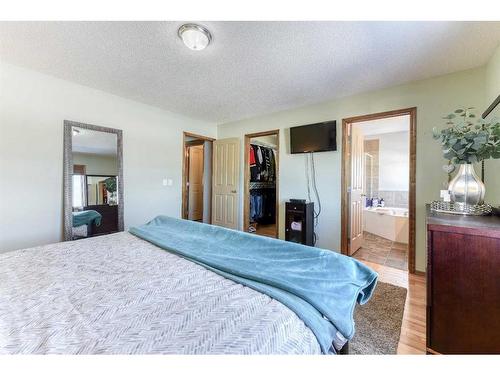 230 Tuscany Vista Road Nw, Calgary, AB - Indoor Photo Showing Bedroom