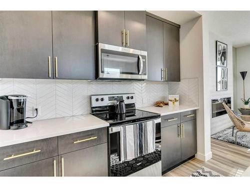 644 Buffaloberry Manor Se, Calgary, AB - Indoor Photo Showing Kitchen With Stainless Steel Kitchen With Upgraded Kitchen