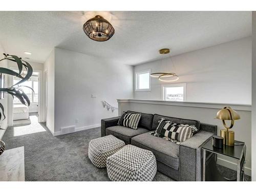 644 Buffaloberry Manor Se, Calgary, AB - Indoor Photo Showing Living Room