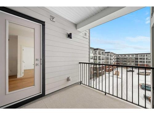 2403-111 Wolf Creek Drive Se, Calgary, AB - Outdoor With Balcony With Exterior