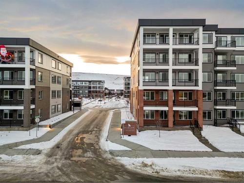 2403-111 Wolf Creek Drive Se, Calgary, AB - Outdoor With Balcony With Facade