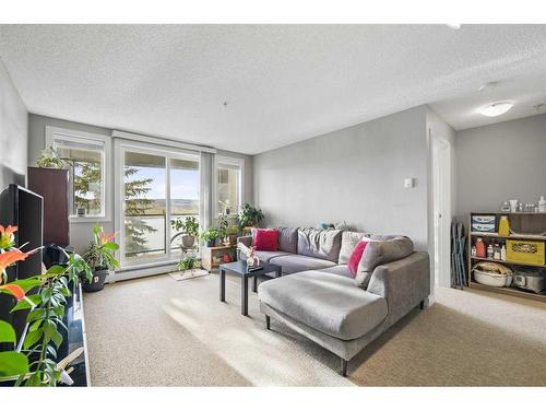 208-120 Country Village Circle Ne, Calgary, AB - Indoor Photo Showing Living Room