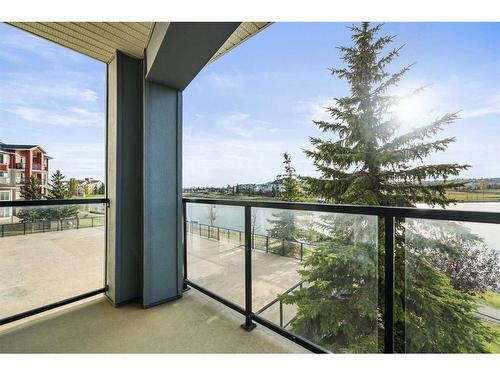 208-120 Country Village Circle Ne, Calgary, AB - Outdoor With Balcony With View With Exterior