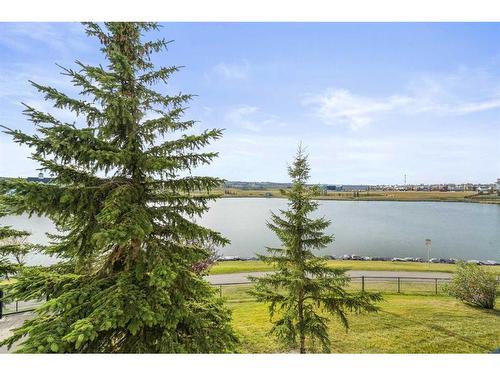 208-120 Country Village Circle Ne, Calgary, AB - Outdoor With Body Of Water With View