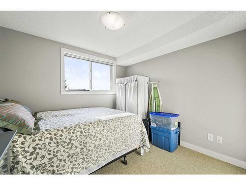 208-120 Country Village Circle Ne, Calgary, AB - Indoor Photo Showing Bedroom