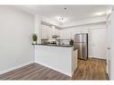 306-1000 15 Avenue Sw, Calgary, AB  - Indoor Photo Showing Kitchen 