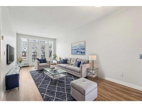 306-1000 15 Avenue Sw, Calgary, AB - Indoor Photo Showing Living Room