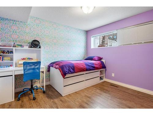 1132 Lake Sylvan Place Se, Calgary, AB - Indoor Photo Showing Bedroom