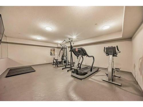 228-500 Rocky Vista Gardens Nw, Calgary, AB - Indoor Photo Showing Gym Room