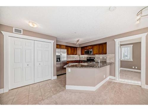 228-500 Rocky Vista Gardens Nw, Calgary, AB - Indoor Photo Showing Kitchen