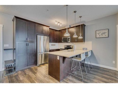 3303-522 Cranford Drive Se, Calgary, AB - Indoor Photo Showing Kitchen With Stainless Steel Kitchen With Upgraded Kitchen