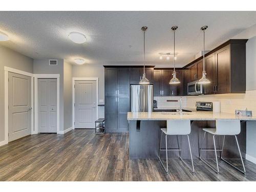 3303-522 Cranford Drive Se, Calgary, AB - Indoor Photo Showing Kitchen With Stainless Steel Kitchen With Upgraded Kitchen