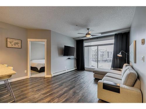 3303-522 Cranford Drive Se, Calgary, AB - Indoor Photo Showing Living Room