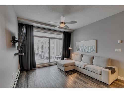 3303-522 Cranford Drive Se, Calgary, AB - Indoor Photo Showing Living Room