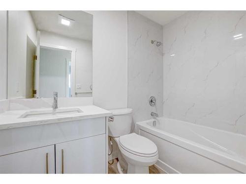 11220 Braxton Road Sw, Calgary, AB - Indoor Photo Showing Bathroom