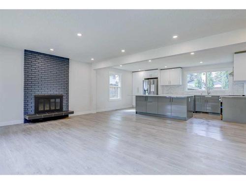 11220 Braxton Road Sw, Calgary, AB - Indoor With Fireplace