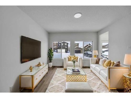 166 Edith Road Nw, Calgary, AB - Indoor Photo Showing Living Room