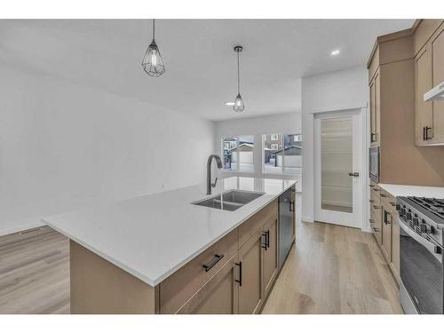 166 Edith Road Nw, Calgary, AB - Indoor Photo Showing Kitchen With Double Sink With Upgraded Kitchen