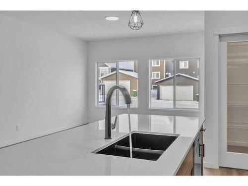 166 Edith Road Nw, Calgary, AB - Indoor Photo Showing Kitchen With Double Sink