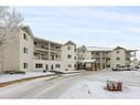 215-3 Parklane Way, Strathmore, AB  - Outdoor With Balcony With Facade 