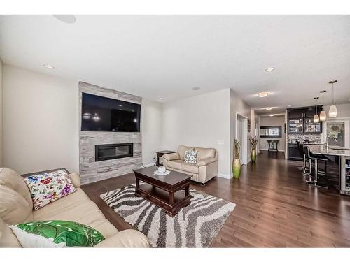 43 Evansglen Circle Nw, Calgary, AB - Indoor Photo Showing Living Room With Fireplace